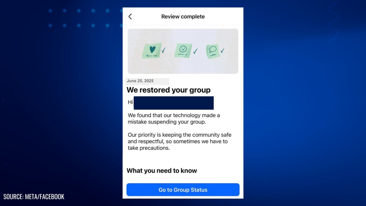 Facebook notification showing a suspended group restored message with explanation of mistaken suspension and a button to check group status.